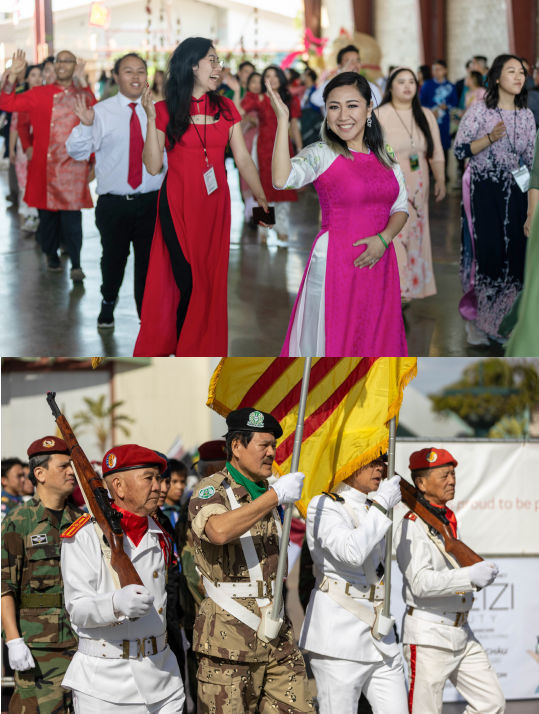 Participants in traditional Vietnamese attire dance and march in a procession, with military personnel in uniform carrying flags. A cultural or national celebration.